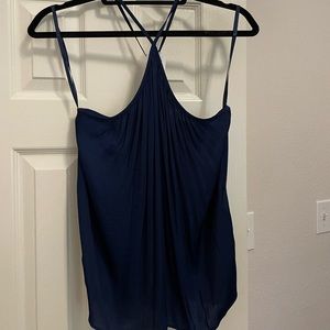 Cross neck navy tank top. (Hung with straps to tuck)